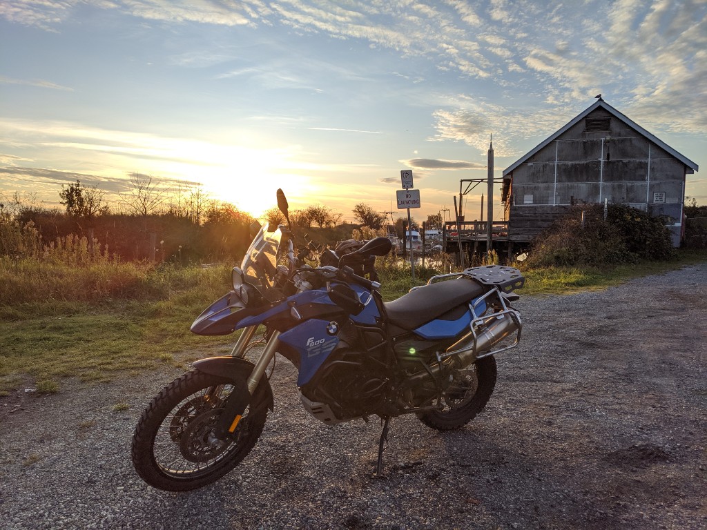 F800GS at golden hour with waterfront background